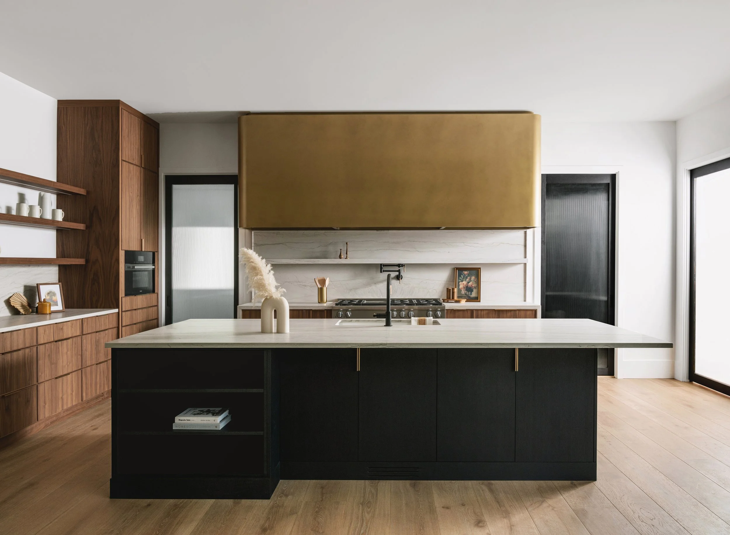 Open custom Honey Cabinetry drawers with natural wood finish